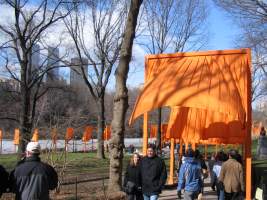 People walking beneath The Gates