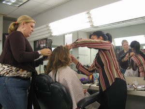 The hair and makeup women working on Susan