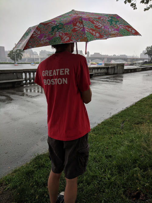 Nat, walking in the rain